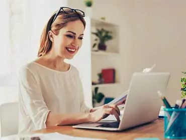 A lady working in her office