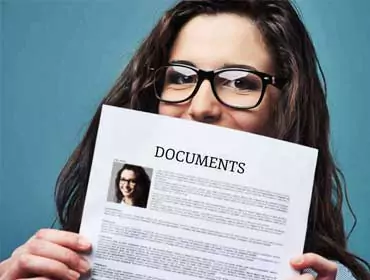 A lady showing some document